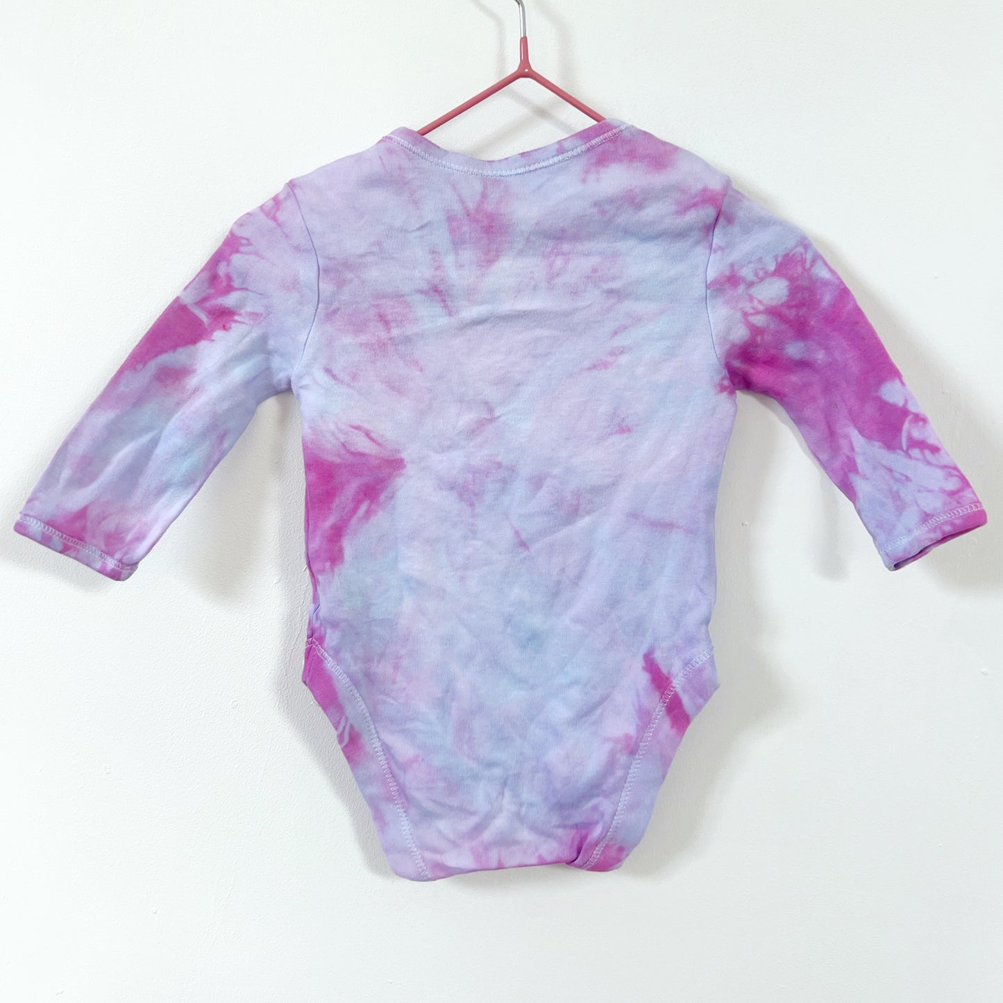 hate is taught tie dye baby grow