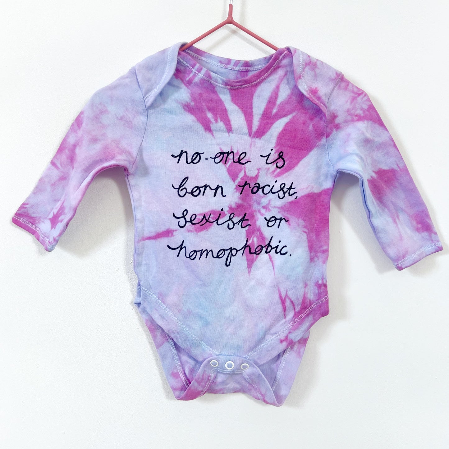 hate is taught tie dye baby grow