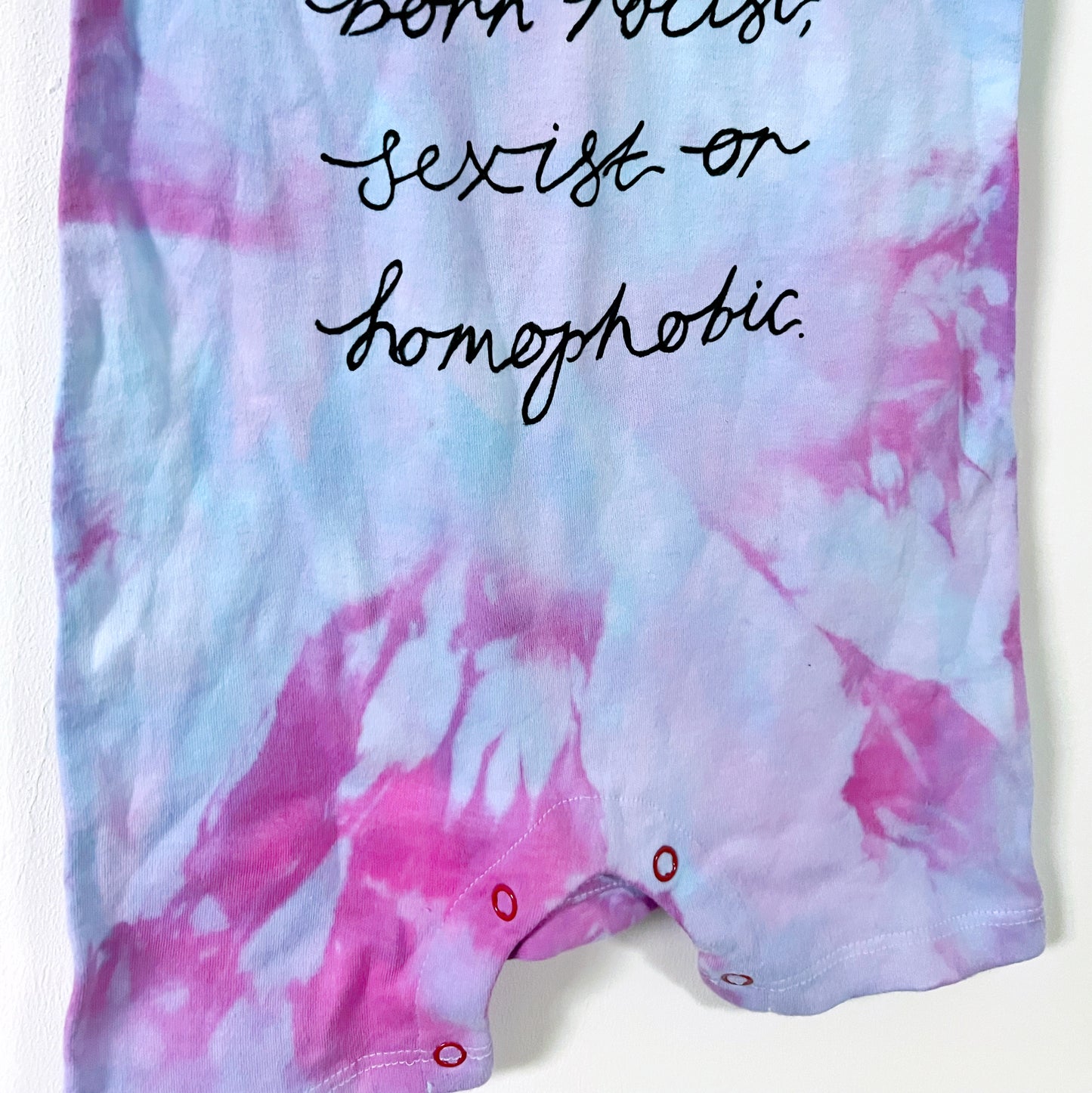 hate is taught... tie dye baby bodysuit