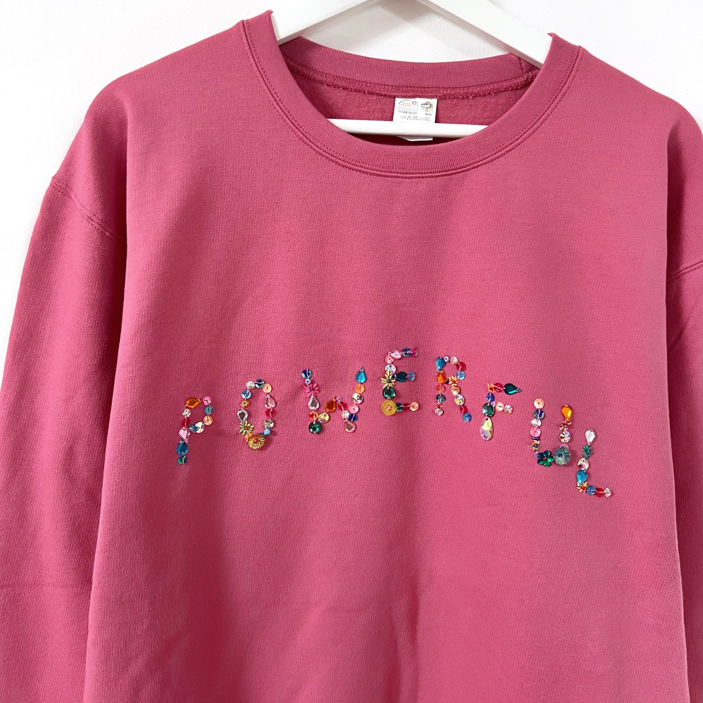 powerful hand-embellished sweatshirt