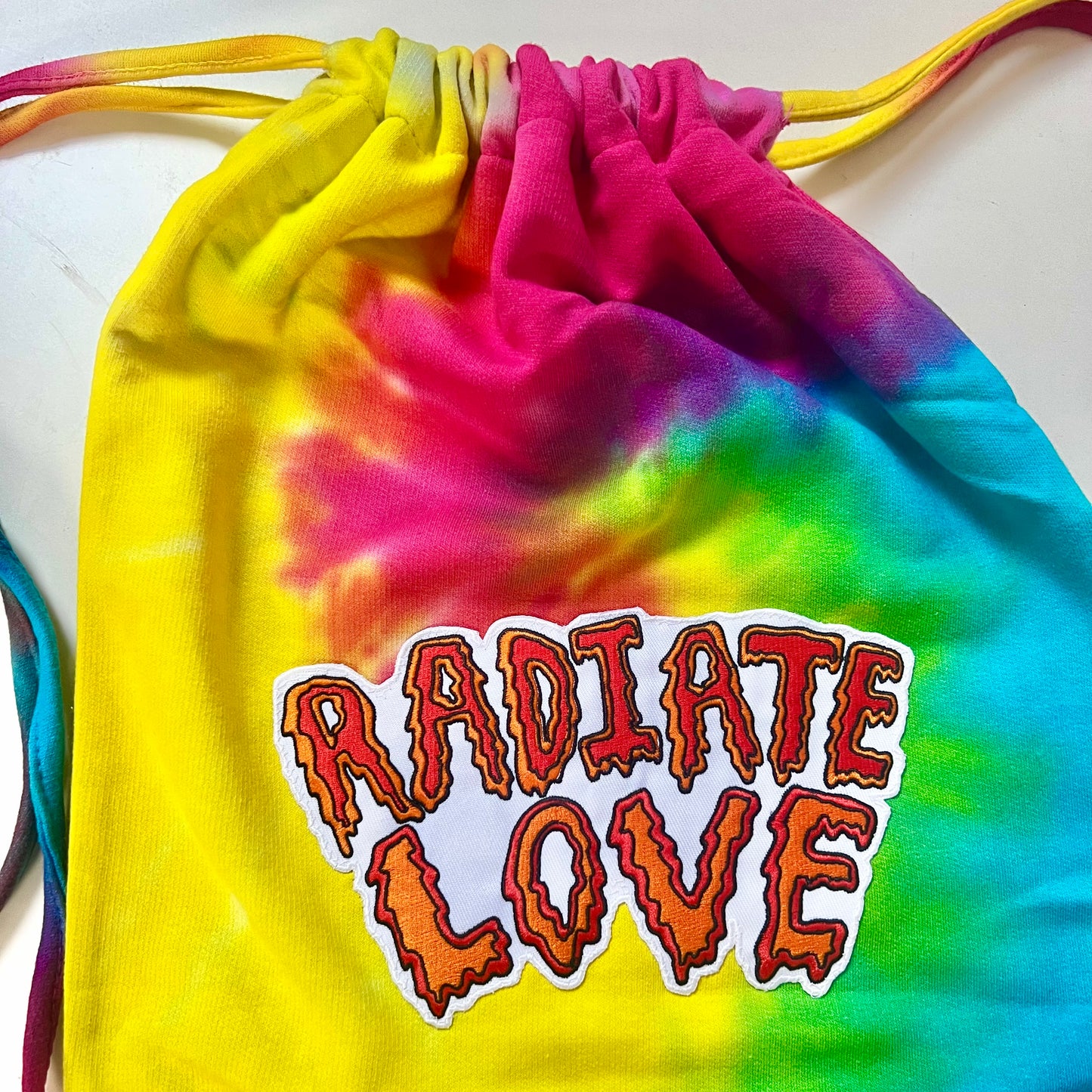 radiate love tie dye bag