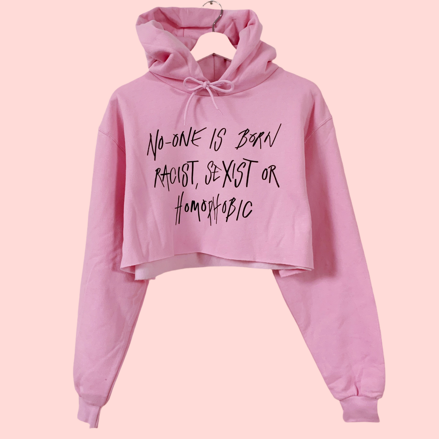 hate is taught cropped hoodie - baby pink