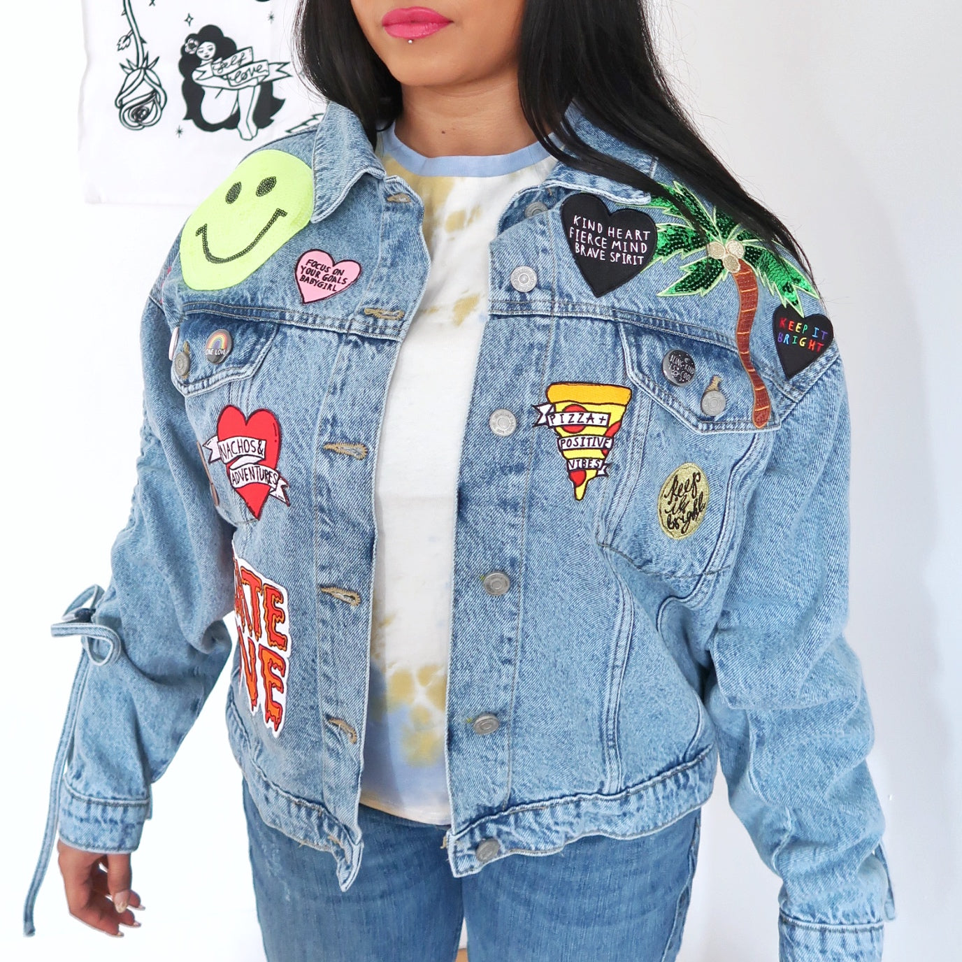 Distressed denim store jacket with patches